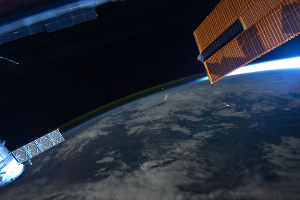 2024 August 9

A Perseid Below
 * Image Credit: Ron Garan, ISS Expedition 28 Crew, NASA

Explanation: 
Denizens of planet Earth typically watch meteor showers by looking up. But this remarkable view, captured on August 13, 2011 by astronaut Ron Garan, caught a Perseid meteor by looking down. From Garan's perspective on board the International Space Station orbiting at an altitude of about 380 kilometers, the Perseid meteors streak below, swept up dust from comet Swift-Tuttle. The vaporizing comet dust grains are traveling at about 60 kilometers per second through the denser atmosphere around 100 kilometers above Earth's surface. In this case, the foreshortened meteor flash is near frame center, below the curving limb of the Earth and a layer of greenish airglow, just below bright star Arcturus. Want to look up at a meteor shower? You're in luck, as the 2024 Perseid meteor shower is active now and predicted to peak near August 12. With interfering bright moonlight absent, this year you'll likely see many Perseid meteors under clear, dark skies after midnight. 

Authors & editors: Robert Nemiroff (MTU) & Jerry Bonnell (UMCP)
NASA Official: Amber Straughn Specific rights apply.
NASA Web Privacy, Accessibility Notices
A service of: ASD at NASA / GSFC,
NASA Science Activation
& Michigan Tech. U.