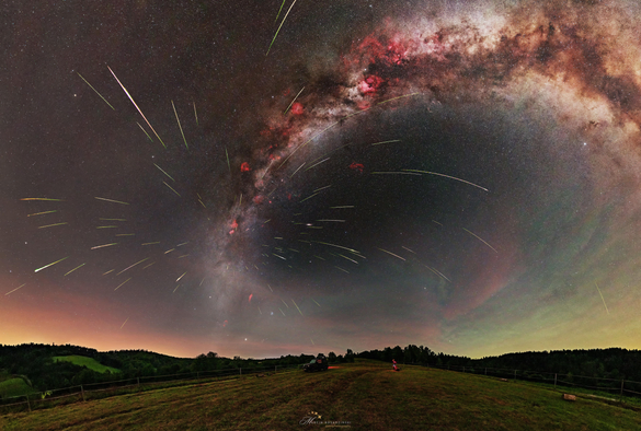2025 August 12
A starfield is shown above a grassy field with hills on the horizon. The band of our Milky Way Galaxy arches across toward the right. Many streaks appear emanating out from a place on the Milky Way just above the horizon. 

Perseids from Perseus
 * Image Credit & Copyright: Marcin Rosadziński

Explanation: 
Where are all of these meteors coming from? In terms of direction on the sky, the pointed answer is the constellation of Perseus. That is why the meteor shower that peaks tonight is known as the Perseids -- the meteors all appear to come from a radiant toward Perseus. In terms of parent body, though, the sand-sized debris that makes up the Perseids meteors come from Comet Swift-Tuttle. The comet follows a well-defined orbit around our Sun, and the part of the orbit that approaches Earth is superposed in front of Perseus. Therefore, when Earth crosses this orbit, the radiant point of falling debris appears in Perseus. Featured here, a composite image taken over six nights and containing over 100 meteors from 2024 August Perseids meteor shower shows many bright meteors that streaked over the Bieszczady Mountains in Poland. This year's Perseids, usually one of the best meteor showers of the year, will compete with a bright moon that will rise, for many locations, soon after sunset. 

Authors & editors: Robert Nemiroff (MTU) & Jerry Bonnell (UMCP)
NASA Official: Amber Straughn Specific rights apply.
