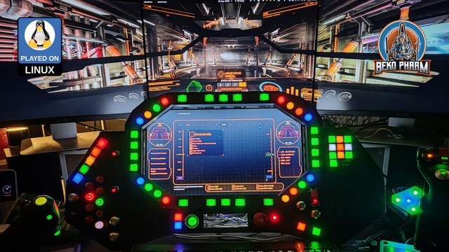 Three monitors form a wall around a box that embeds a fourth monitor, many buttons and switches in various colours are also implemented. Some LED display the status of a spaceship. The computer game that is played with this contraption is Elite Dangerous Odyssey